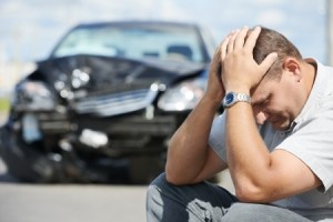 Man in front of automobile crash car collision accident in city road